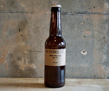 Load image into Gallery viewer, A single bottle of The Kernel Brewery IPA - HBC 1019. It is stood infront of a concrete wall. 
