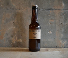 Load image into Gallery viewer, A single bottle of The Kernel Brewery Pale Ale - Citra. it is stood infront of a concrete wall. 
