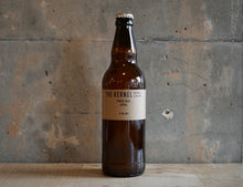 Load image into Gallery viewer, A single bottle of The Kernel Brewery Pale Ale - Citra (500ml). It is stood infront of a concrete wall. 
